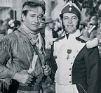 John Wayne and French officer
in 'Fighting Kentuckian'.